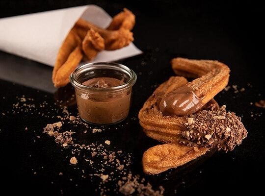 KitKat Churros dipped in chocolate sauce