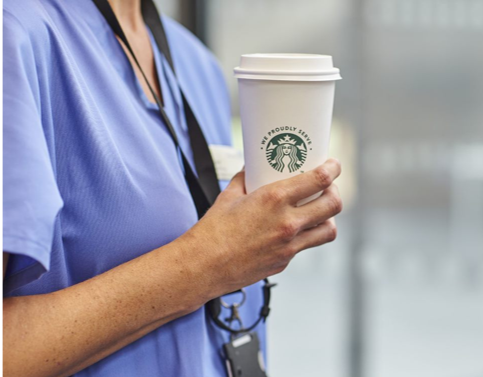 doctor drinking starbucks coffee