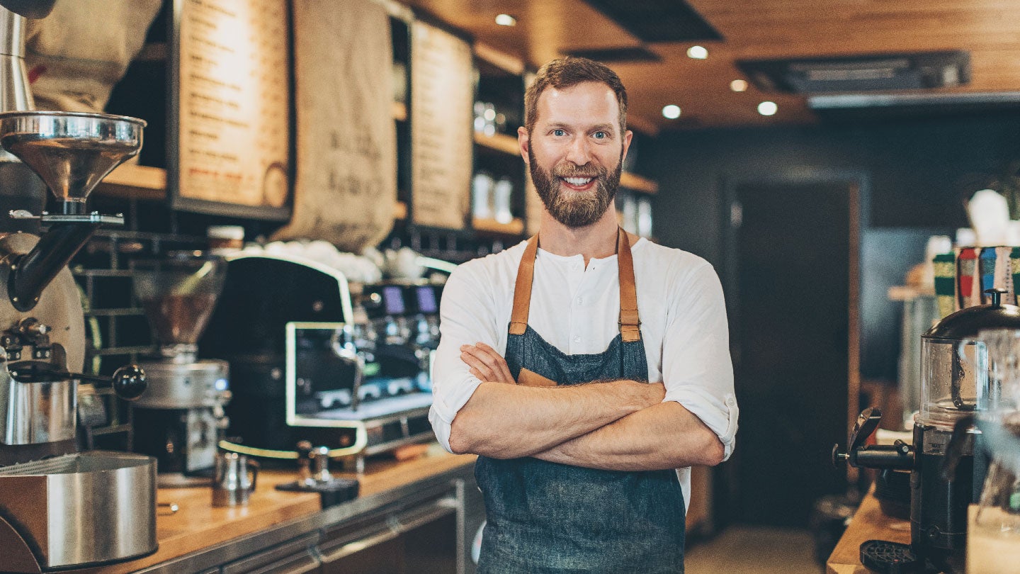Man standing in a coffee shop