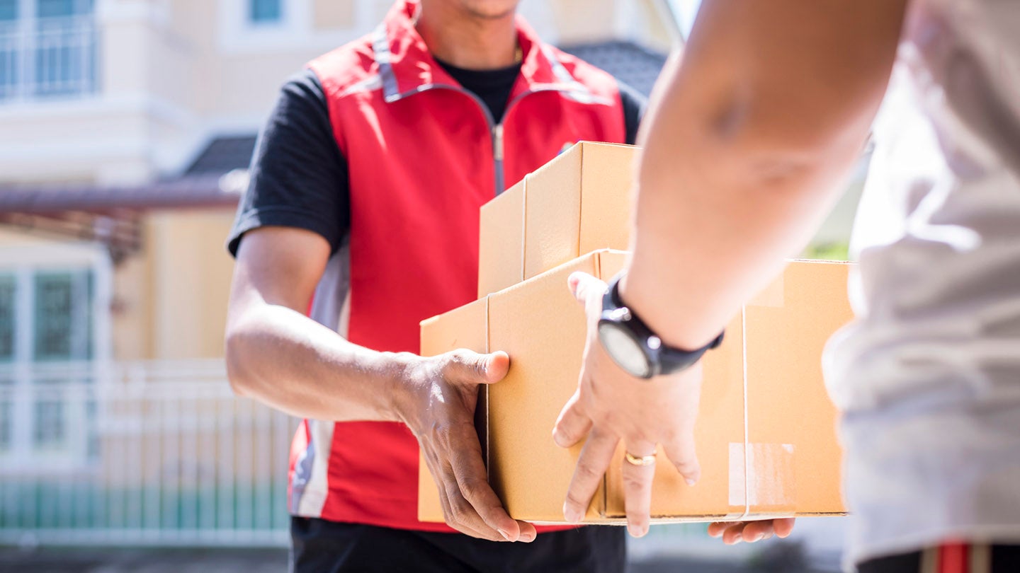 Person delivering parcel