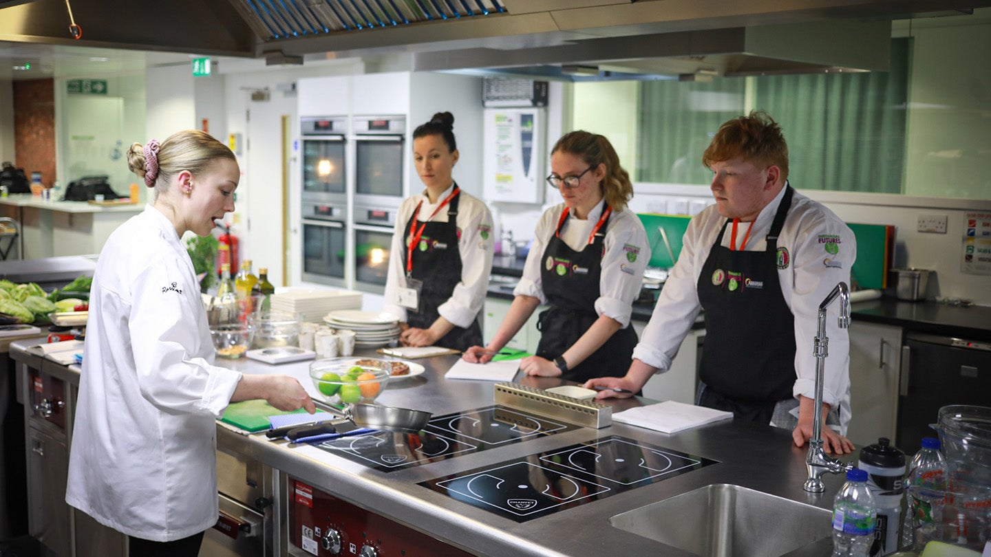 Three competitors with Judge Louisa