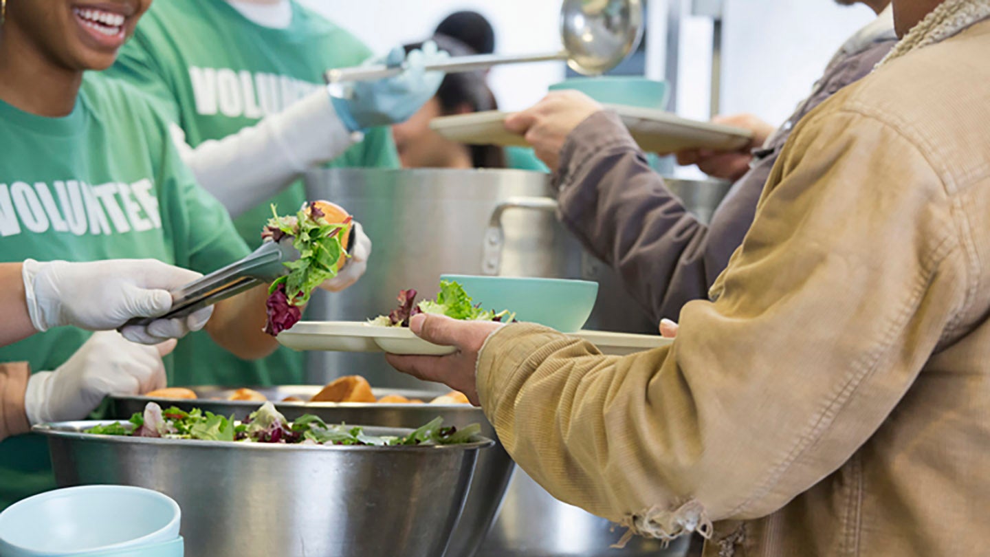 volunteers serving food