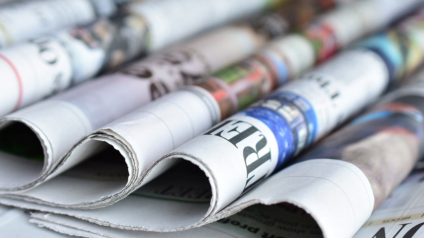 a close up of newspapers