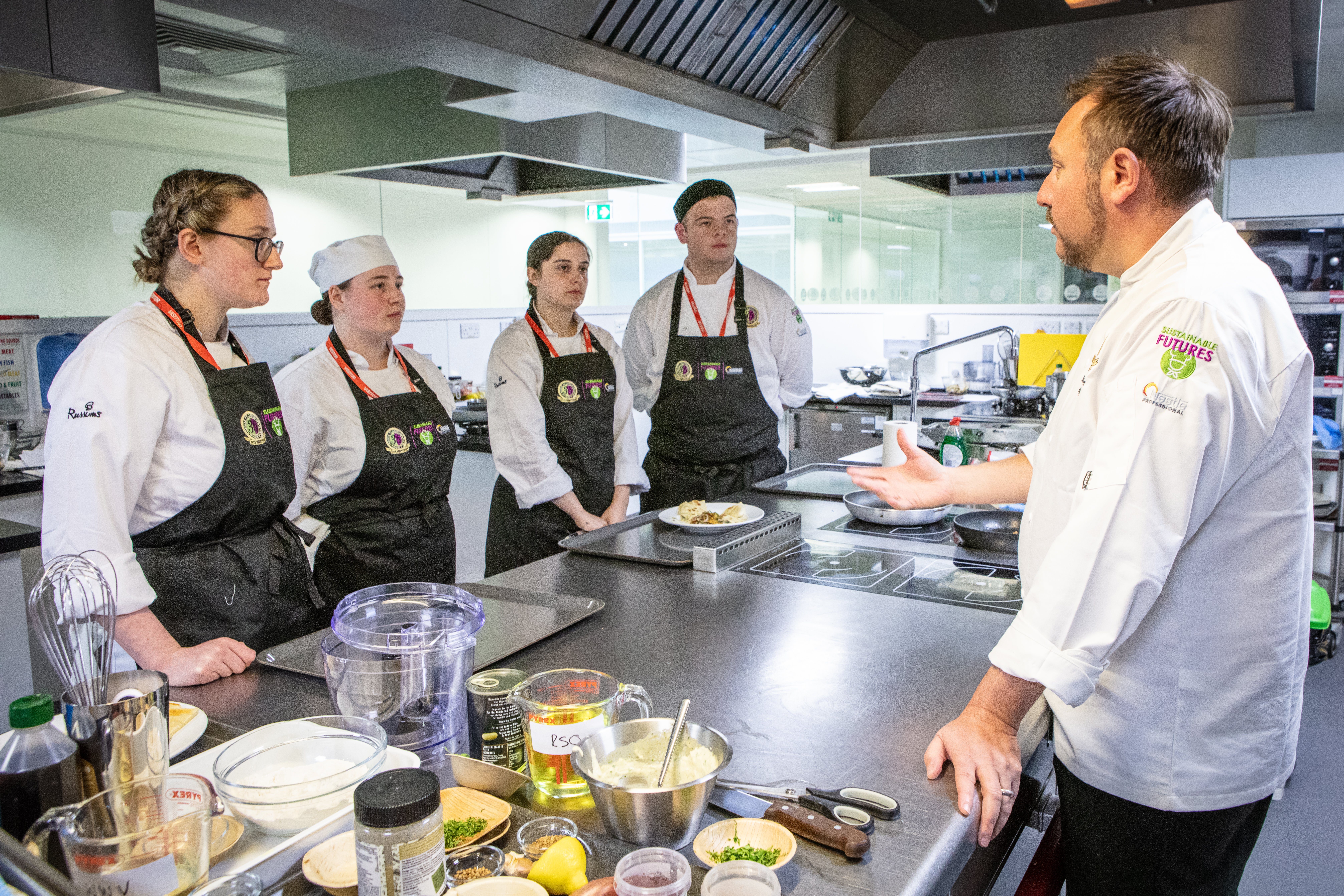 Four Toque d’Or competitors with chef Paul Fletcher