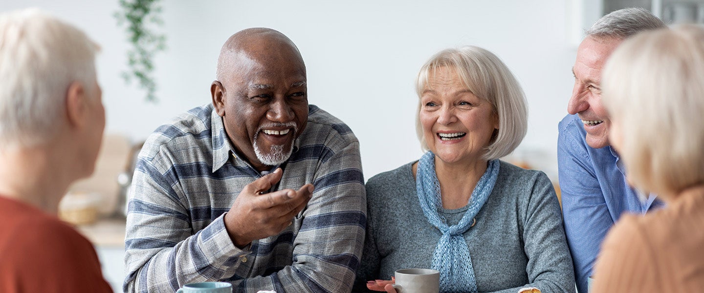 Creating A Positive Culture In Care Homes hero image - groups of residents talking