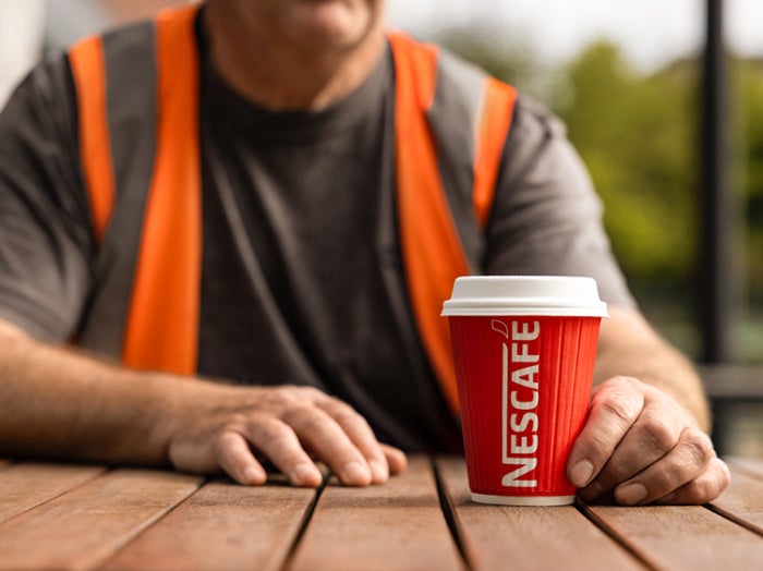 Construction worker drinking a coffee