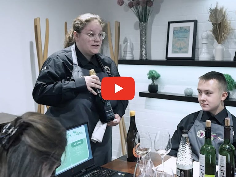 Student presenting in the fine dining challenge