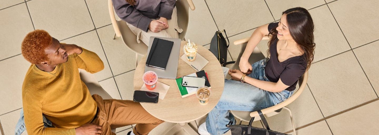 students drinking Starbucks coffee at university's cafeteria