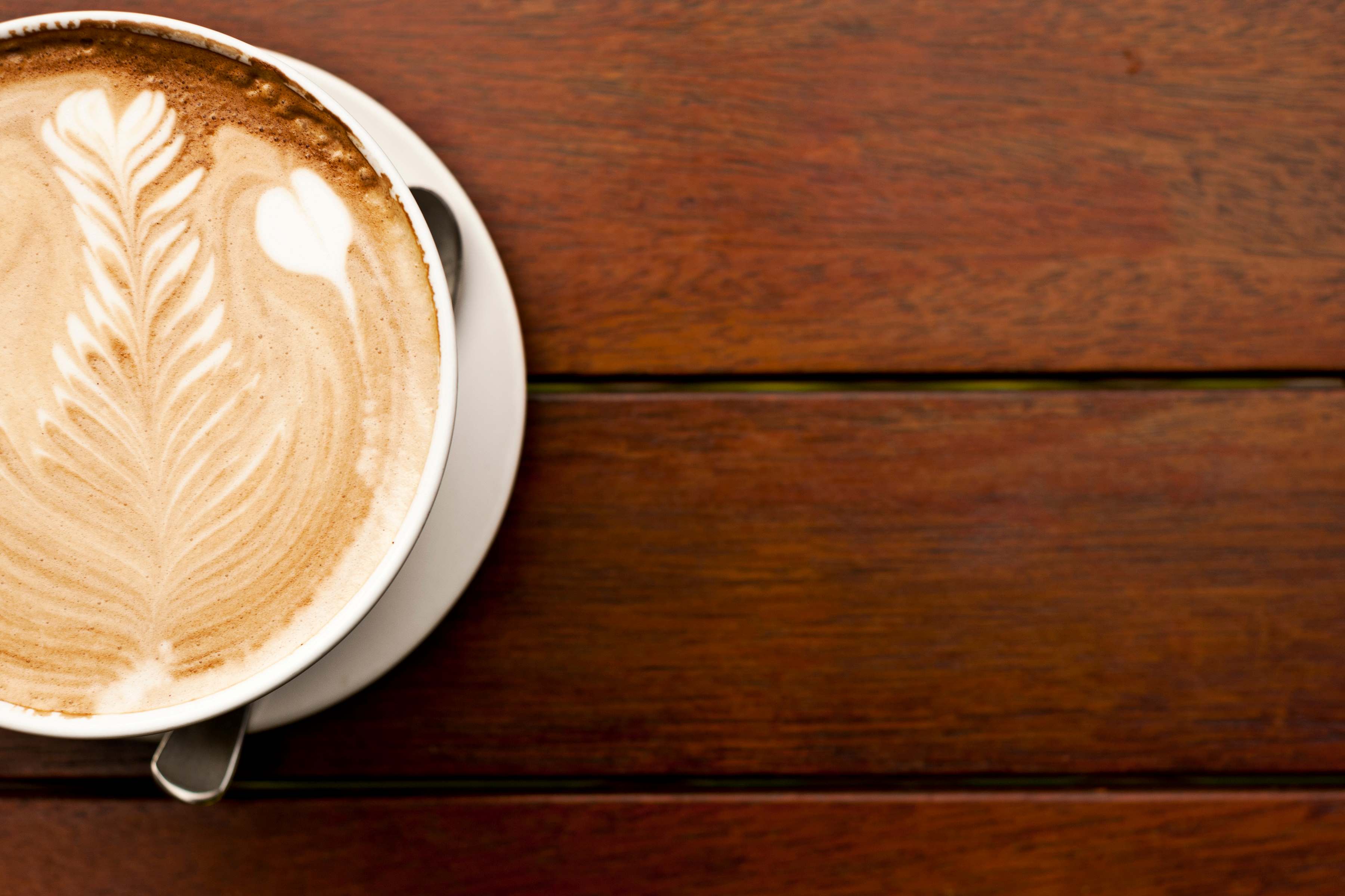 overhead shot of cappuccino in a mug