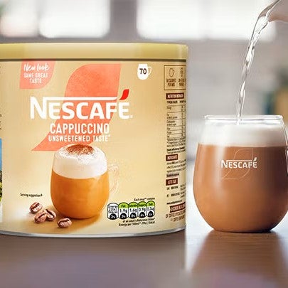 nescafe frothy tin and mug