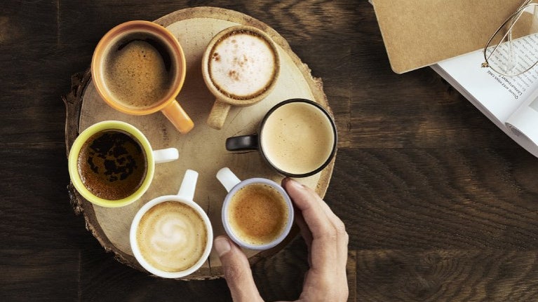plate of coffee mug full of coffee