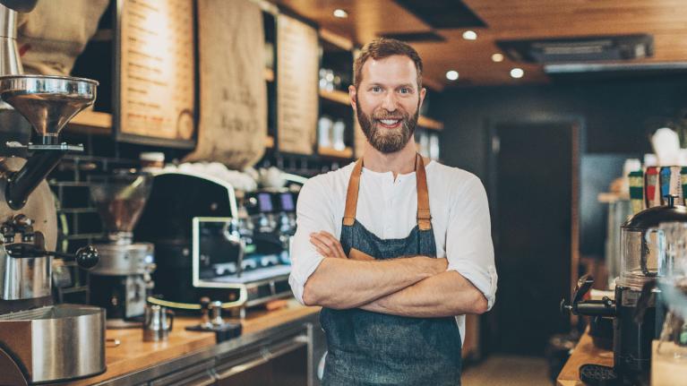 Man standing in a coffee shop