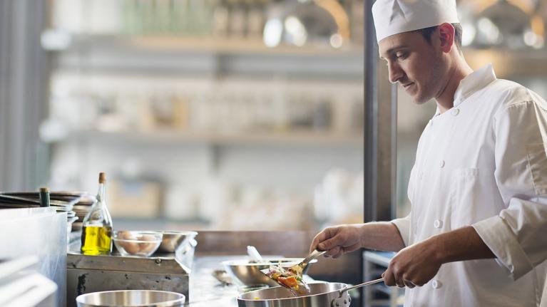 a chef cooking a dish
