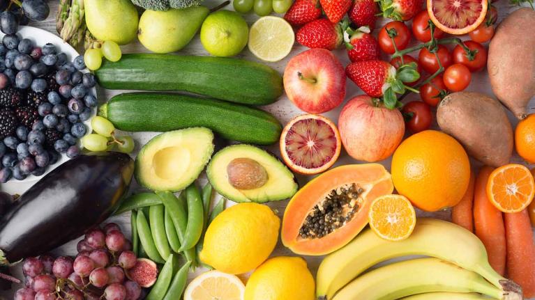 a colourful spread of fruit and veg