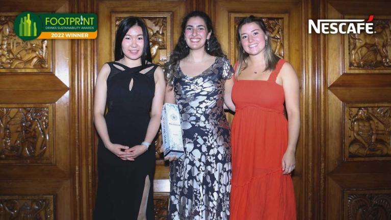 Nescafe team collecting award