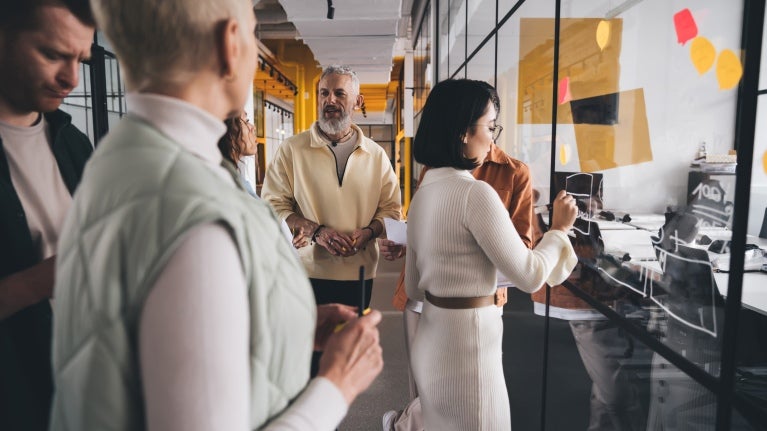 employees-being-productive-in-planning-meeting