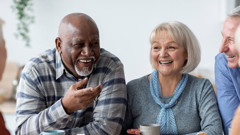 Creating A Positive Culture In Care Homes hero image - groups of residents talking