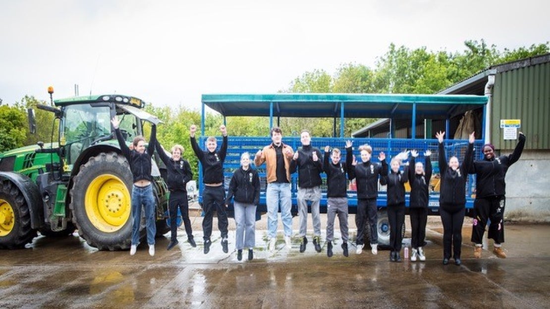 Toque d'Or 2023 finalists jumping for joy at the farm