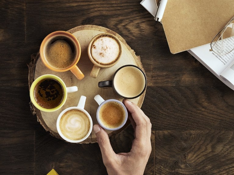 plate of coffee mug full of coffee