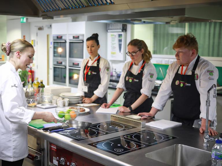 Three competitors with Judge Louisa