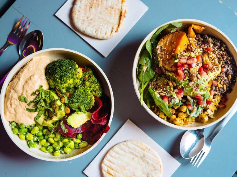 plant based meals on a blue table