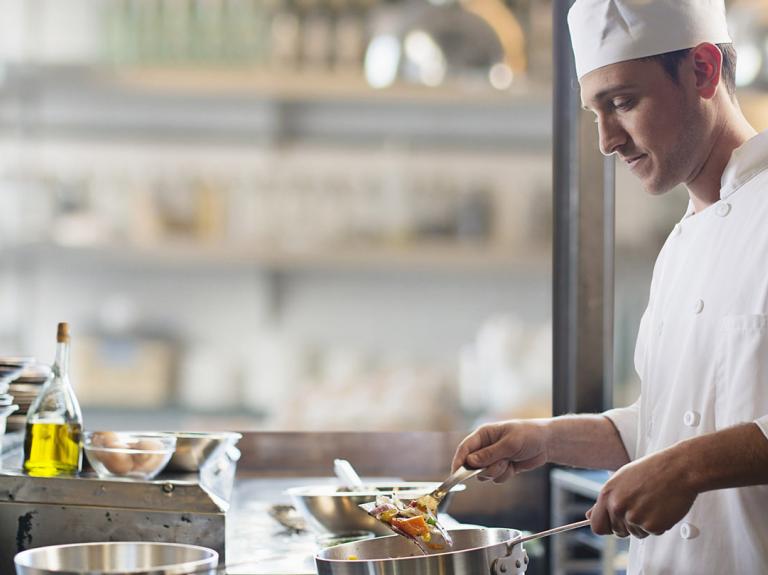 a chef cooking a dish