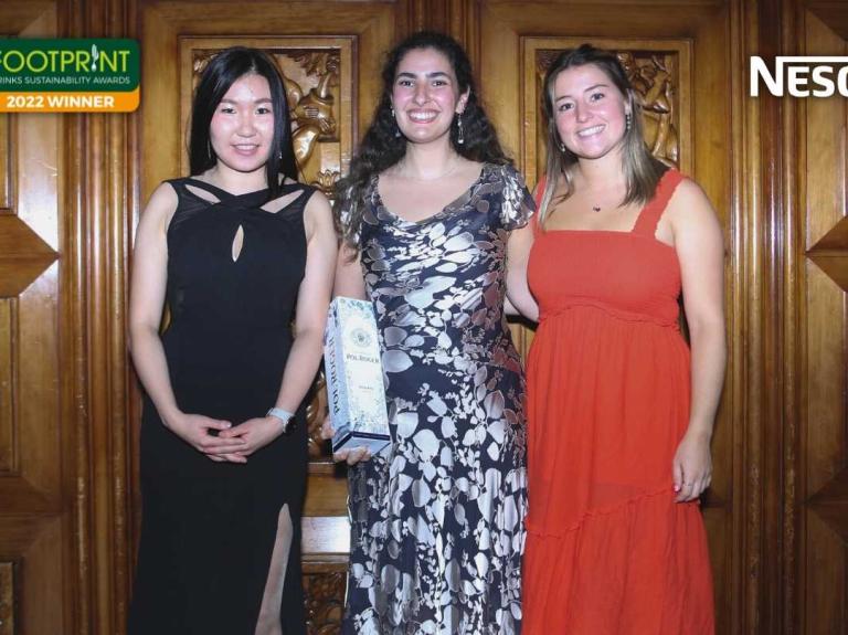 Nescafe team collecting award