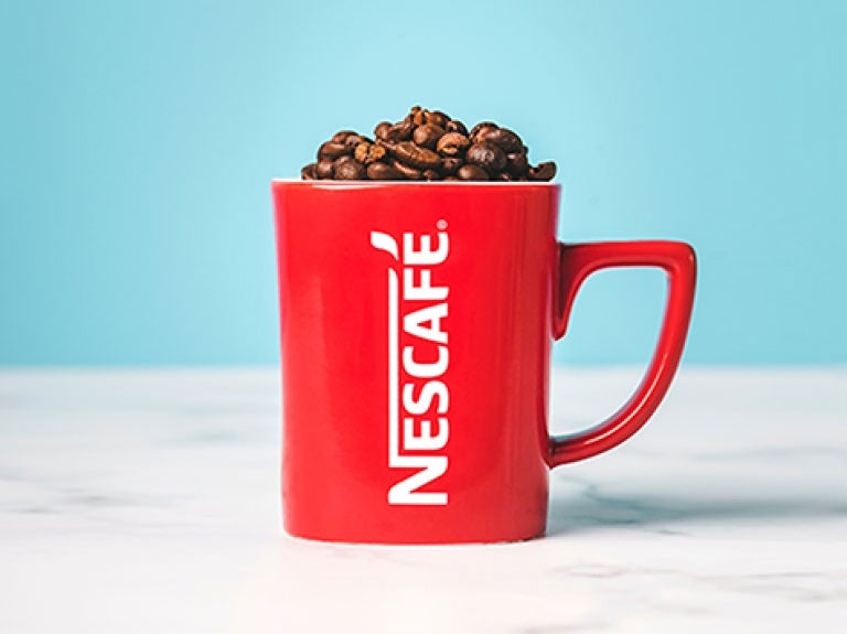 red nescafe mug