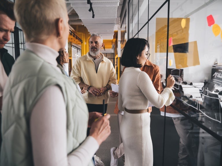 employees-being-productive-in-planning-meeting