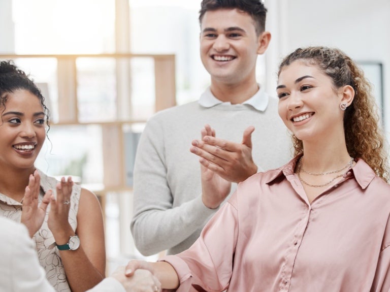 manager greeting employees