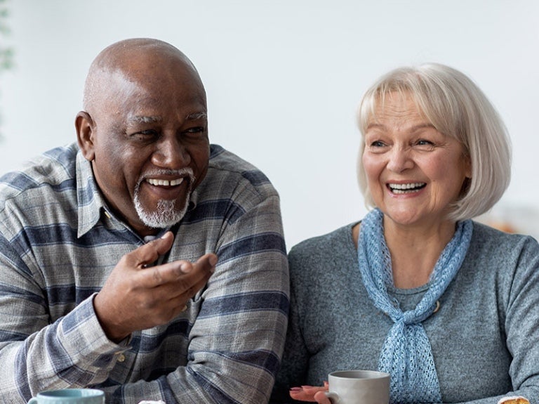Creating A Positive Culture In Care Homes hero image - groups of residents talking