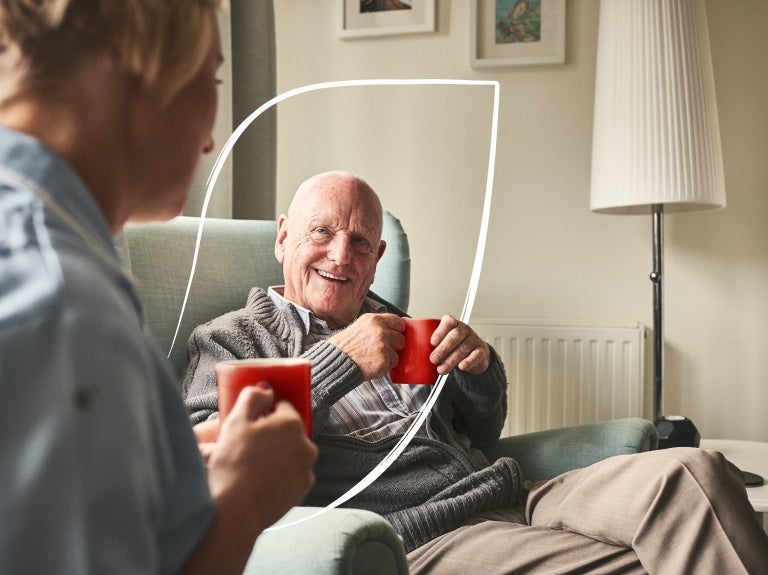 nescafe care home activity pack AW24 showing an elderly man drinking nescafe coffee