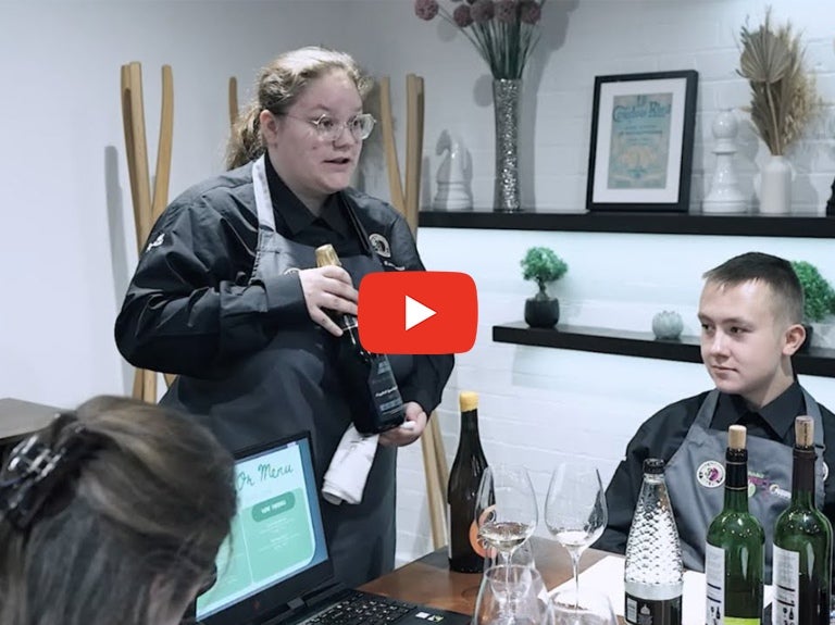 Student presenting in the fine dining challenge
