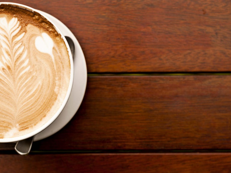 overhead shot of cappuccino in a mug