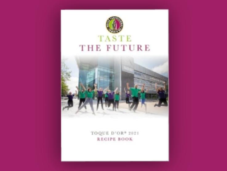 Taste the future recipe book cover on pink backdrop