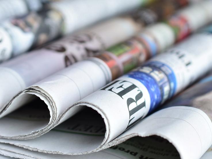 a close up of newspapers