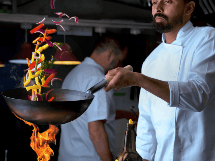 chef cooking with maggi sauces