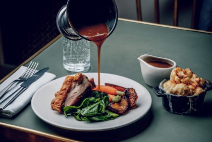 gravy poured on roast dinner