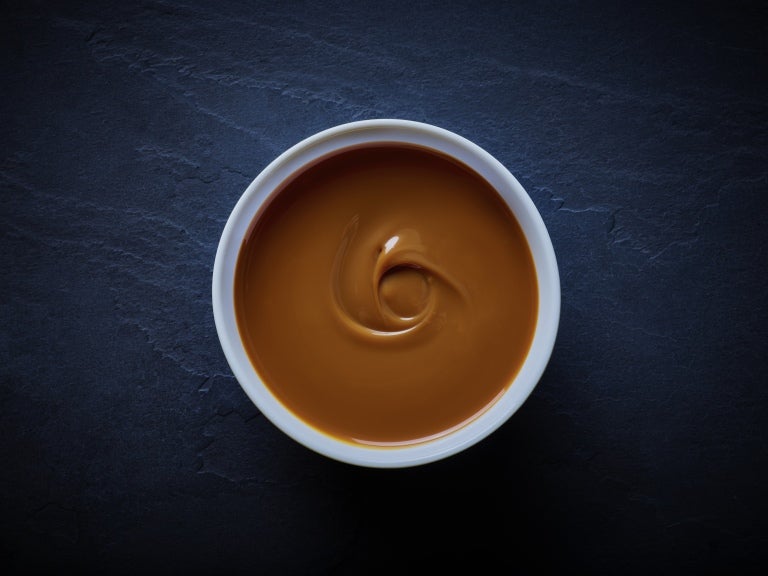Carnation Dulce De leche in a small bowl