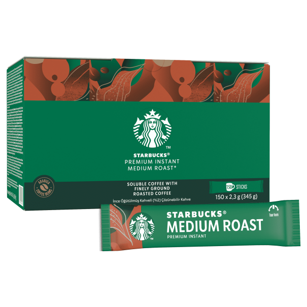 Packaging of Starbucks Premium Instant Medium Roast coffee, featuring a green box with artistic designs and a stick of coffee