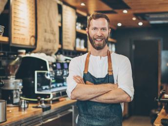Man standing in a coffee shop