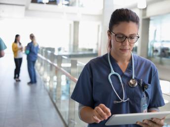 healthcare professional looking at notes