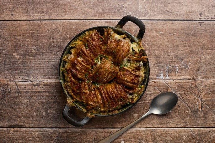 truffle spinach potato gratin dish plated