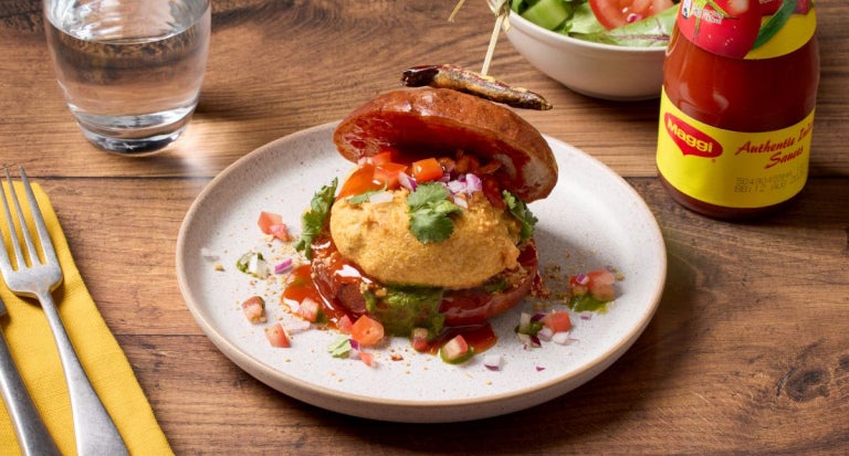 saag vada pav dish plated