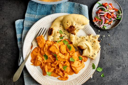 A plate of vegan fillet tikka masala