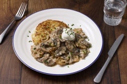 Zurich-Style Rosti with Creamy Mushroom dish on a white plate