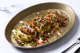 tikki chaat with chole and gravy dish plated