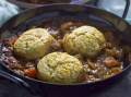 Beef and vegetable stew with mashed potato and parsley dumplings