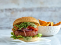 green burger served with watercress mayo