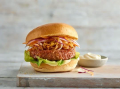 Korean burger on a wooden platter